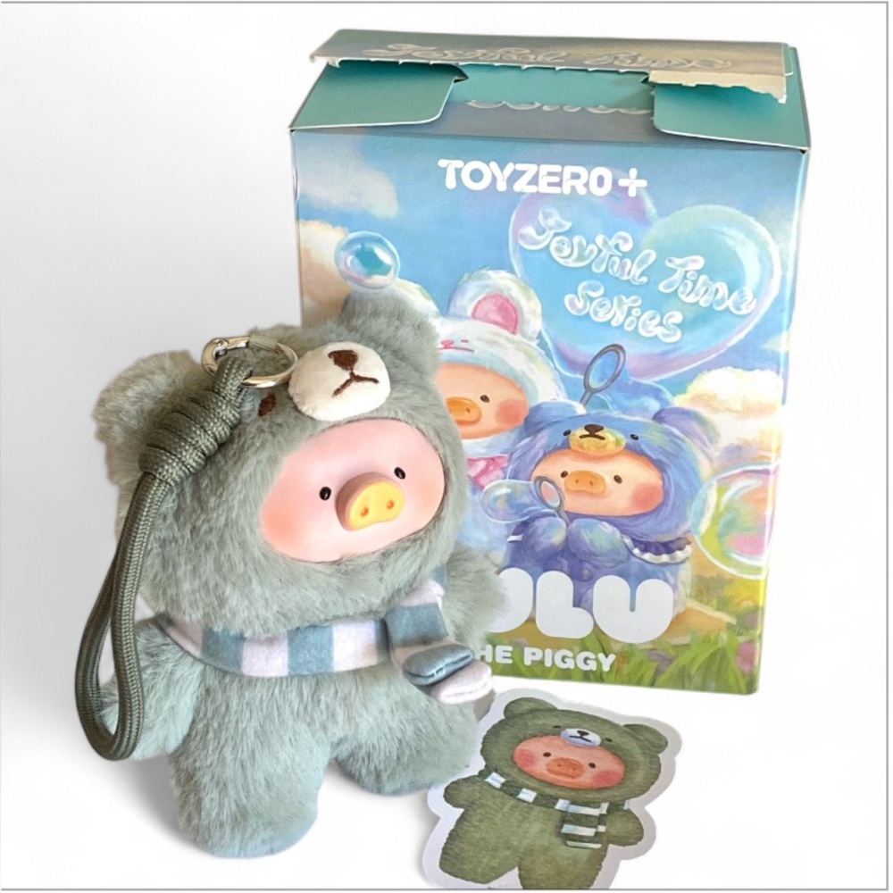 Lulu Piggy Teddy bag charm with sticker and a plastic protective display box NEW